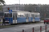 Kraków sporvognslinje 16 med ledvogn 148 på plac Centralny Imienia Ronalda Reagana (2011)