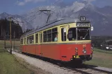 Postkort: Innsbruck Stubaitalbahn (STB) med ledvogn 86 ved Nockhofweg (1986)