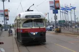 San Francisco F-Market & Wharves med motorvogn 1077 ved The Embarcadero & Stockton Street (2010)