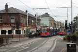 Sheffield Lilla Linje med lavgulvsledvogn 112 på Langsett Road (2011)