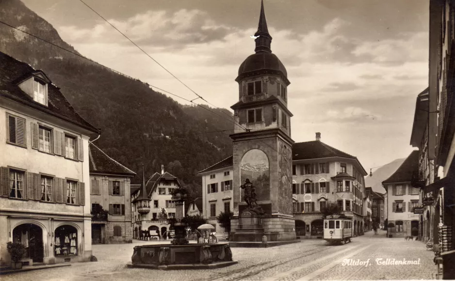 Postkort: Altdorf regionallinje Altdorf-Flüelen med motorvogn 4 nær Telldenkmal (1906)