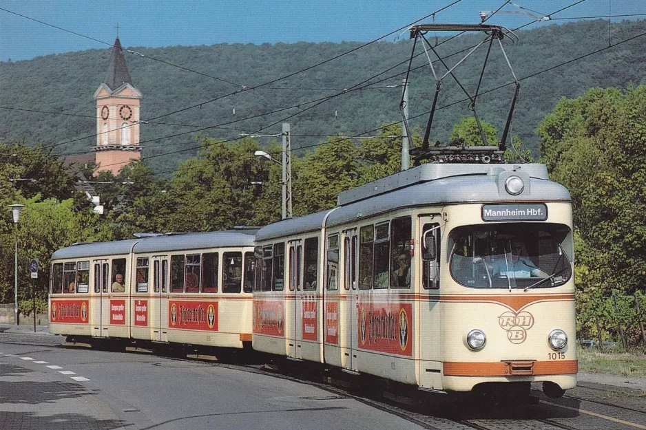 Postkort: Bad Dürkheim Rhein-Haardtbahn 4 med ledvogn 1015 nær Bahnhof (1994)