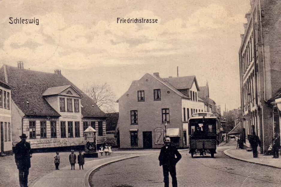 Postkort: Schleswig Friedrichstrasse. (1900)