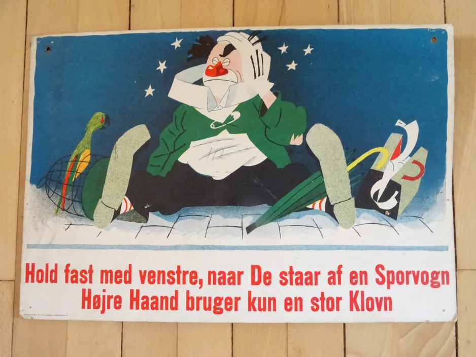 Skilt: Hold fast med venstre, naar De staar af en Sporvogn
 (1955)